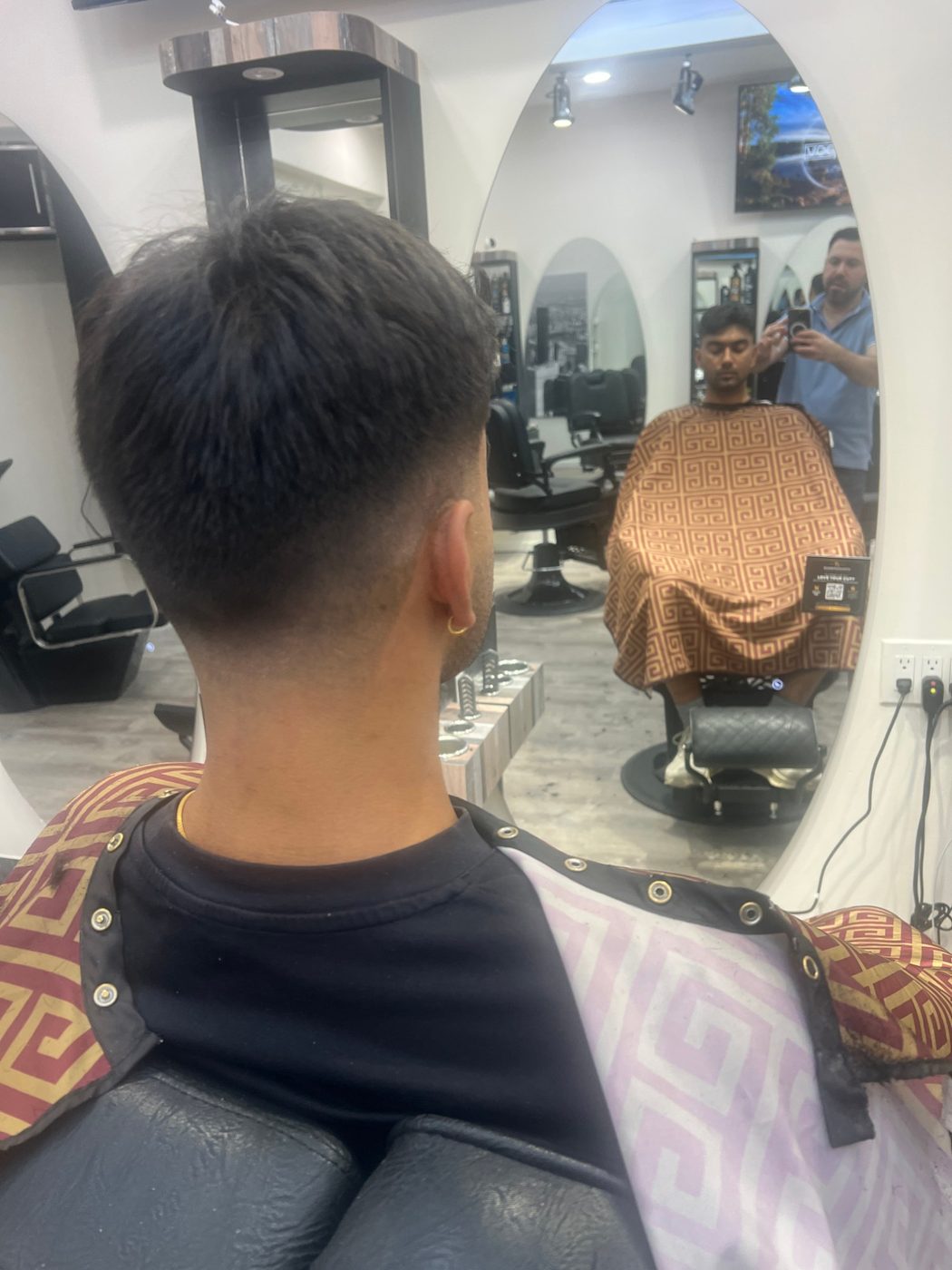 Classic fade haircut by Barbers on 25th
